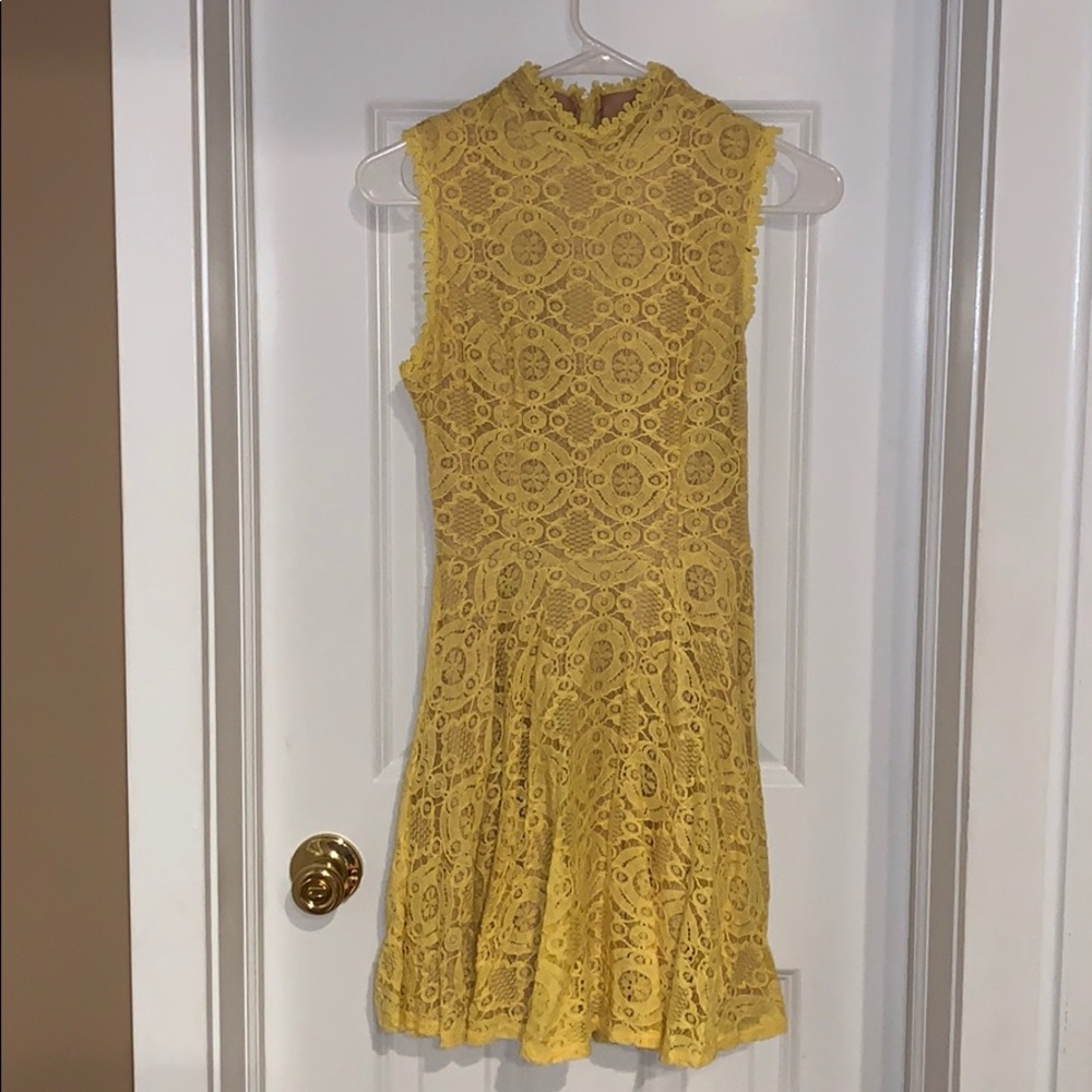 Yellow laced dress.